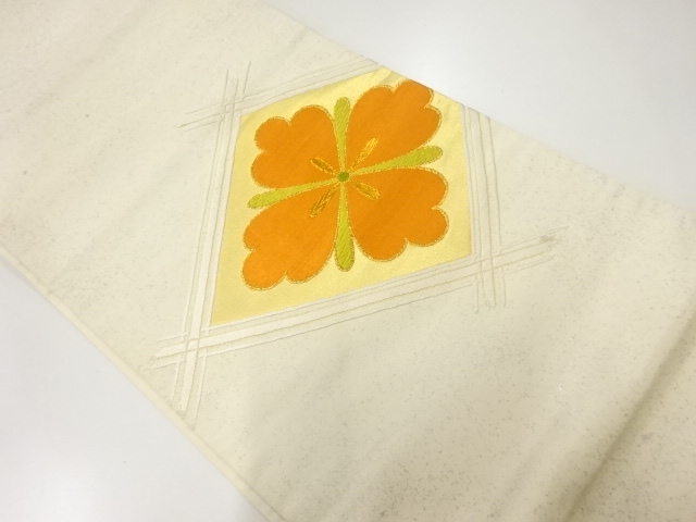 菱に花模様織出し刺繍袋帯